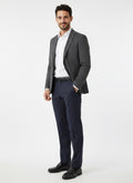 Donkerblauwe pantalon (we raden je aan een maat kleiner te bestellen)